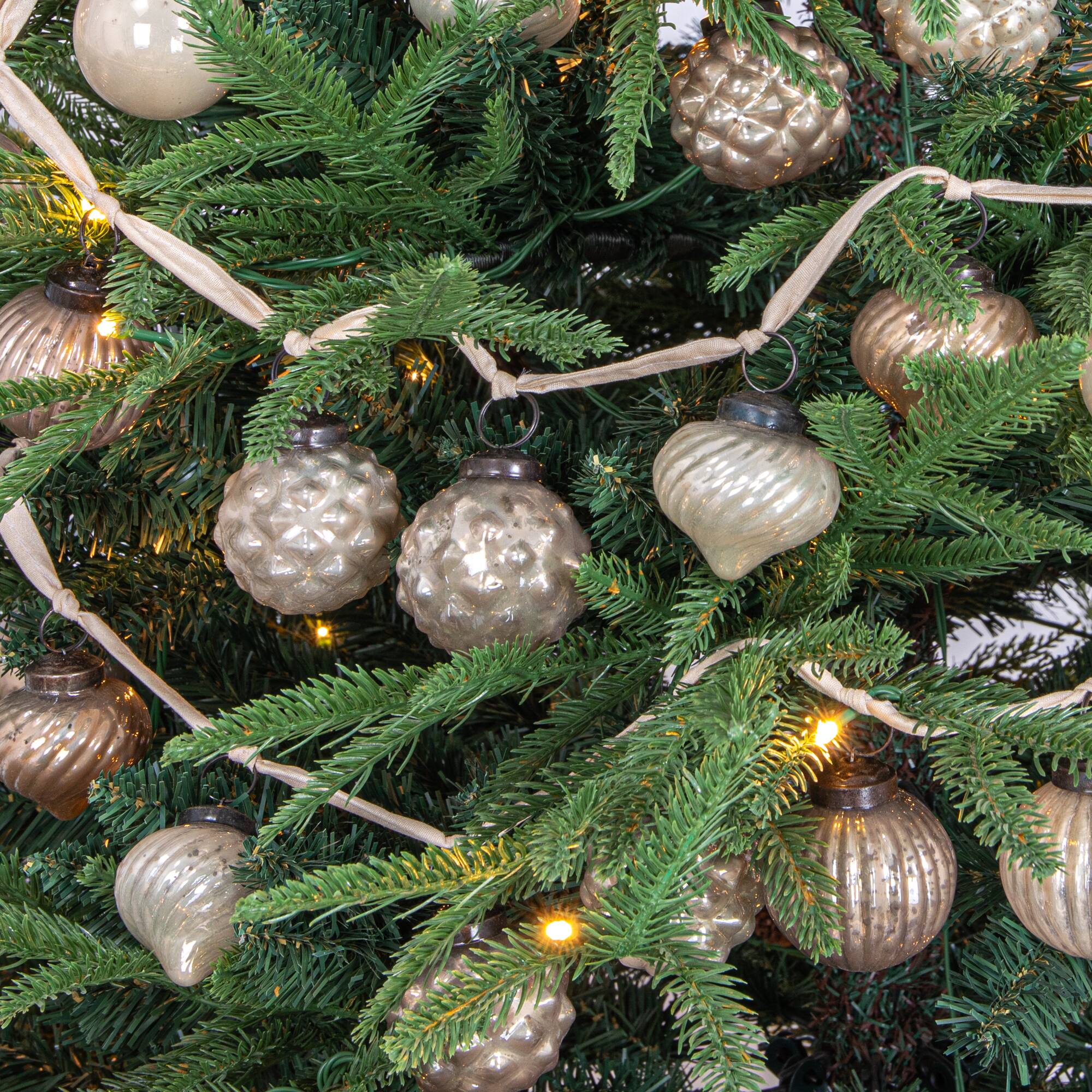 Hello Honey® 6ft. Silver & White Embossed Mercury Glass Ornament Garland